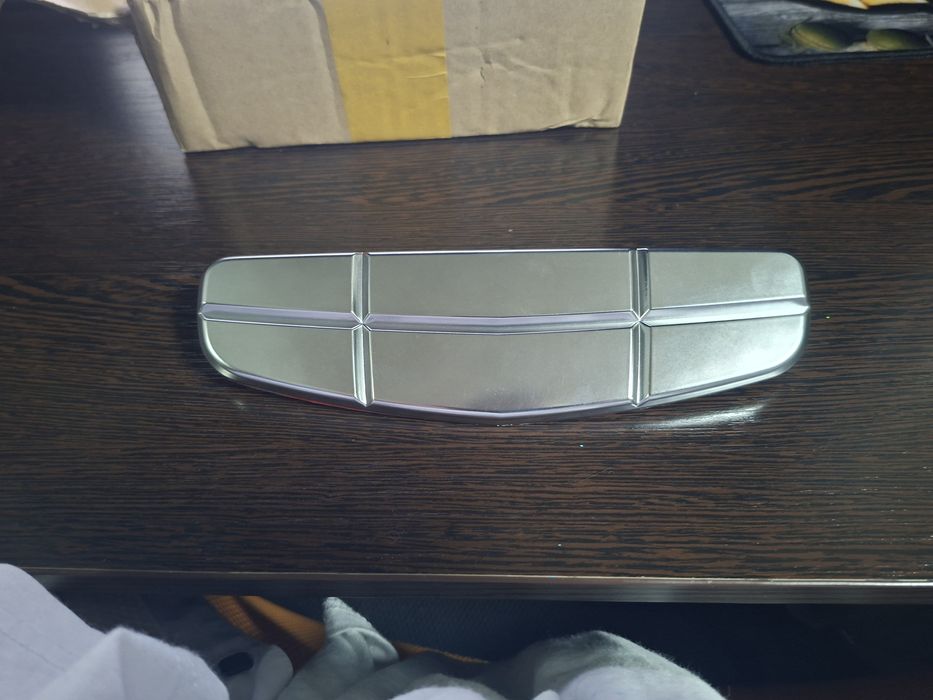 Geely emgrand  Значек