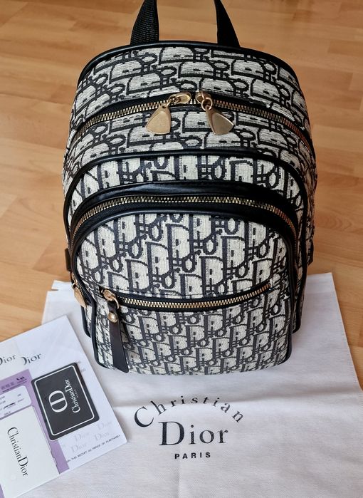 Rucsac Ch.Dior model unisex, material textil, feronerie metalica, saculet, etichetă