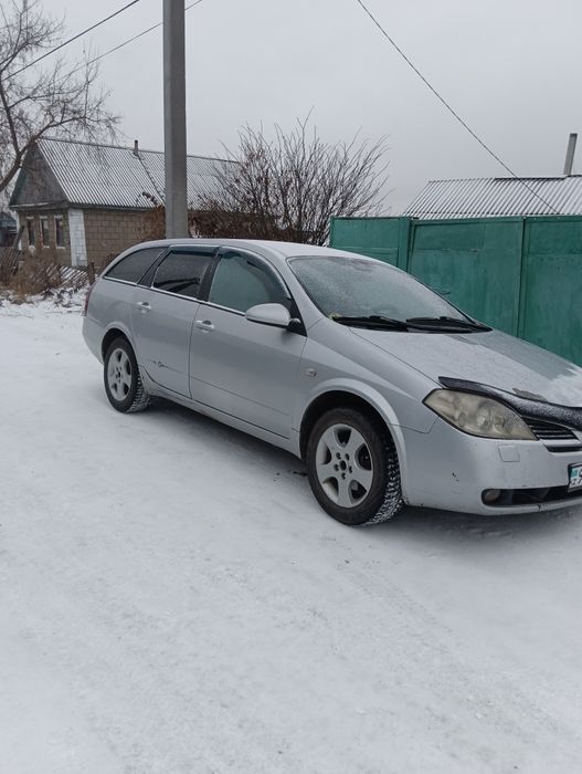 Ниссан примьера р12 2002г.