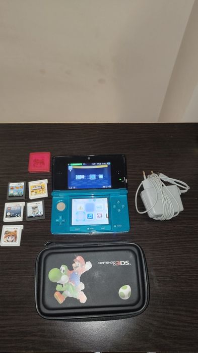 Nintendo 3DS – stare foarte bună + 5 jocuri + husă + încărcător