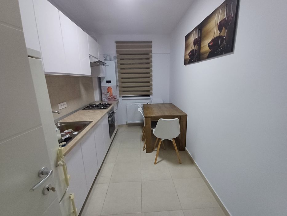 Ofer spre închiriere apartament 2 camere ,loc de parcare Conest Ozana