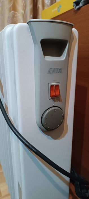 Масляный обогреватель