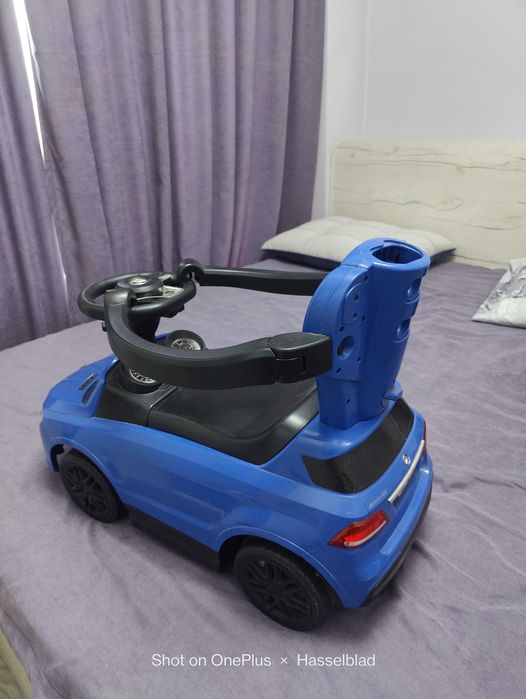 Машинка для катания детей.