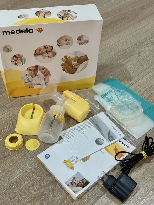 Электрический молокоотсос MEDELA