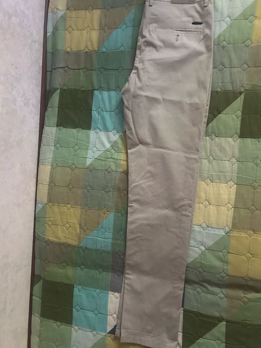 Продам брюки новые
