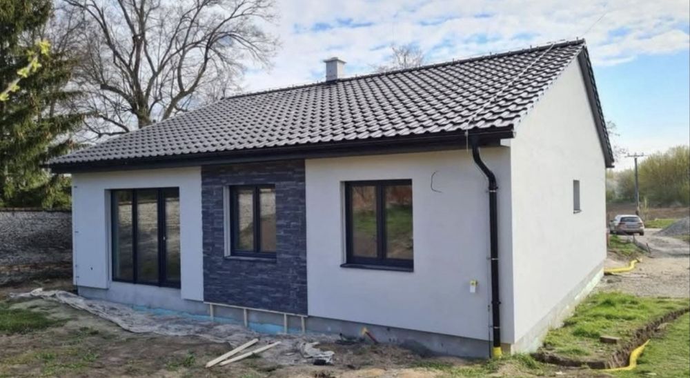 Executam case din panouri sendwich si lemn