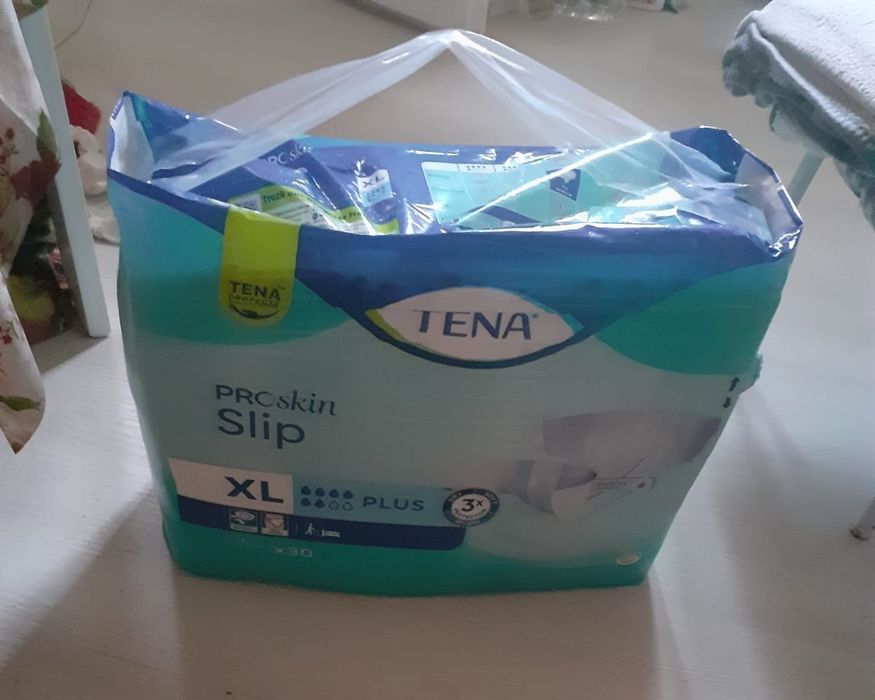 Pampersi adulti XL