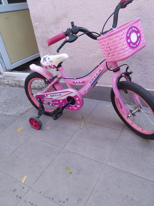 De vânzare bicicleta roz