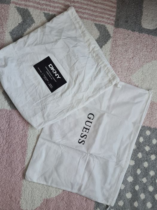 Saci de depozitare genti Guess și DKNY