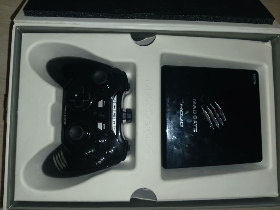 Продам приставку Mad Catz M.O.J.O.