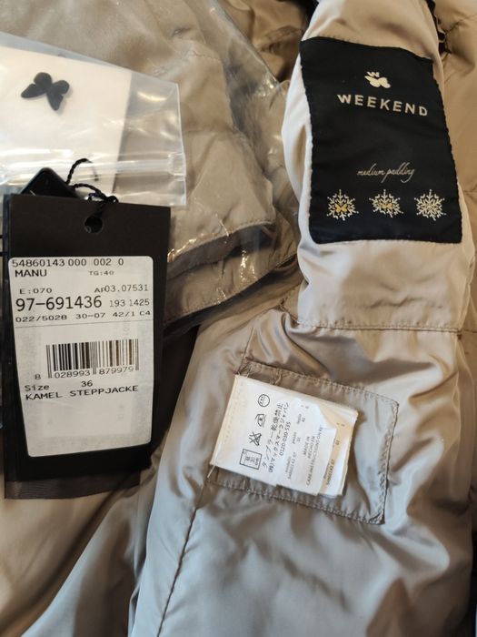 Продается пуховик  брендовый