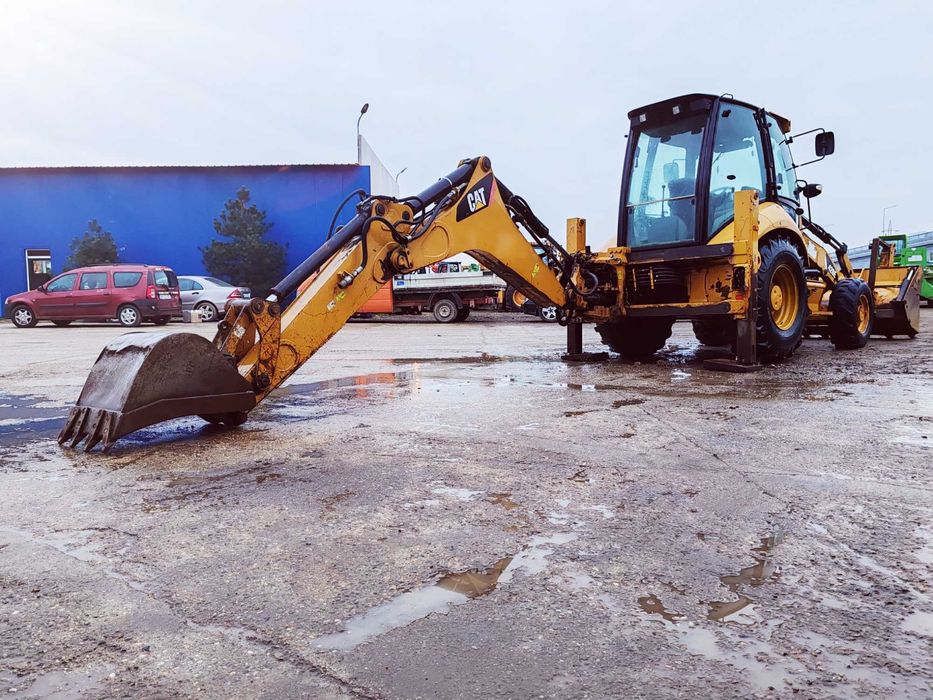 Buldoexcavator Caterpillar 428E 4x4 din 2008 Accept orice test