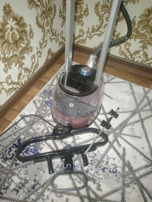 Паровой.       Утюг