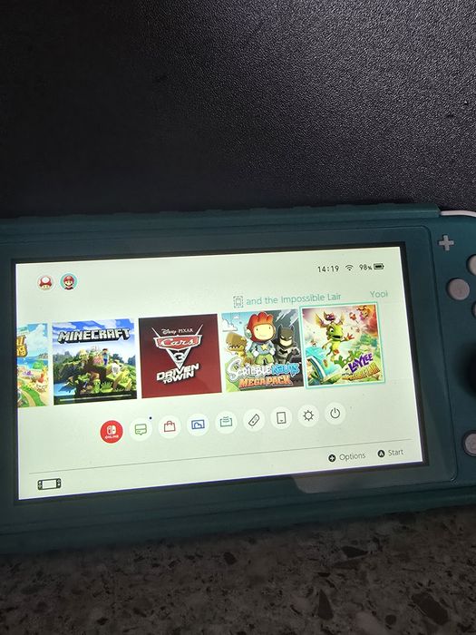 Конзола Nintendo Switch Lite + 9 игри и пълен комплекm akcecoapu
