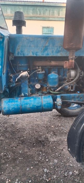 Продам трактор с телегами и плуг