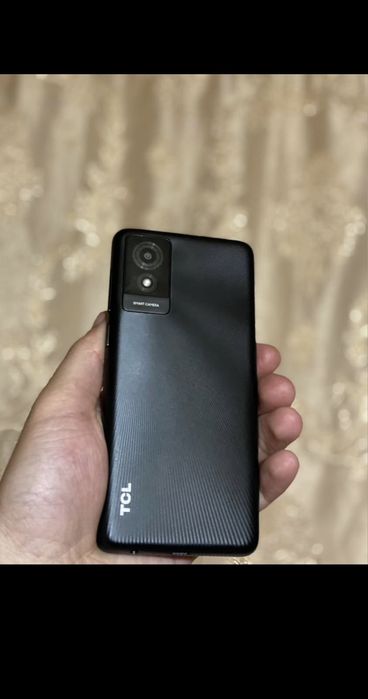 Vand telefon TCL