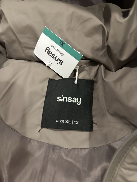 Vesta dama, noua cu eticheta