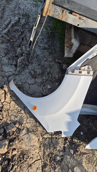 Aripa stânga dreapta fata  Chevrolet Spark 2013