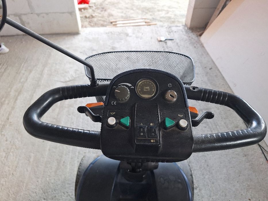 Carut electric pentru persoane cu probleme de mobilitate