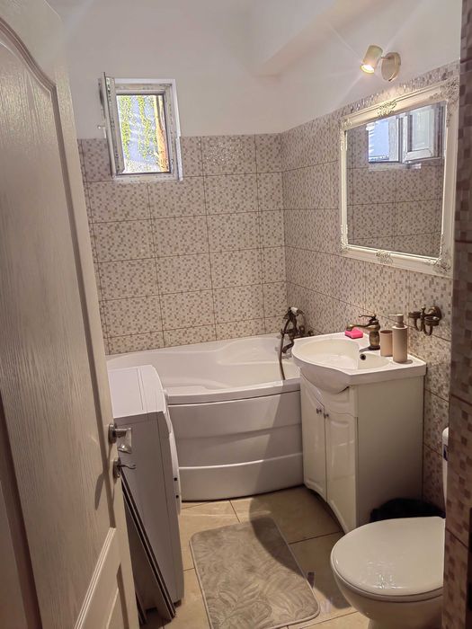 Închiriere apartament 2 camere cu curte proprie