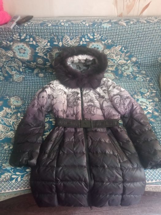 Продам пуховик б/у