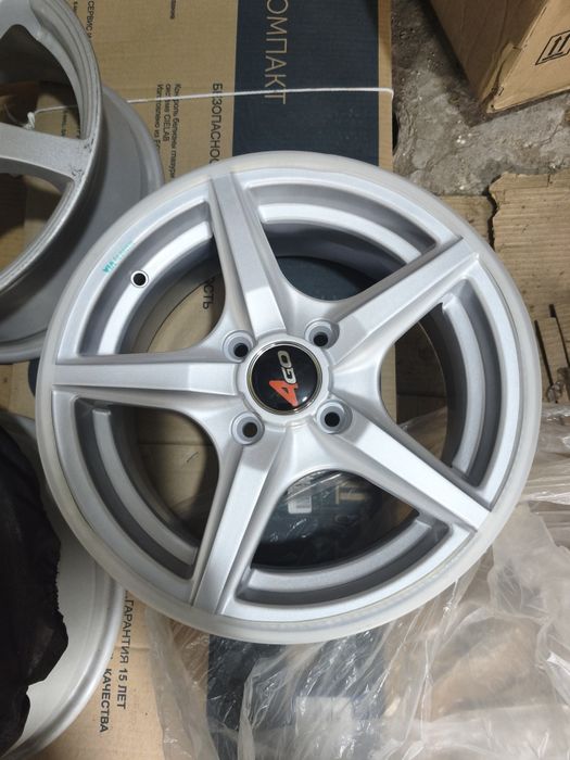 Продам 1 легкосплавный диск 4*100 R14