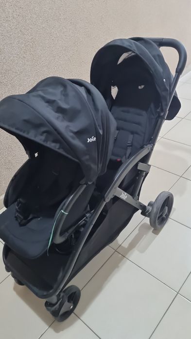 Коляска для погодок