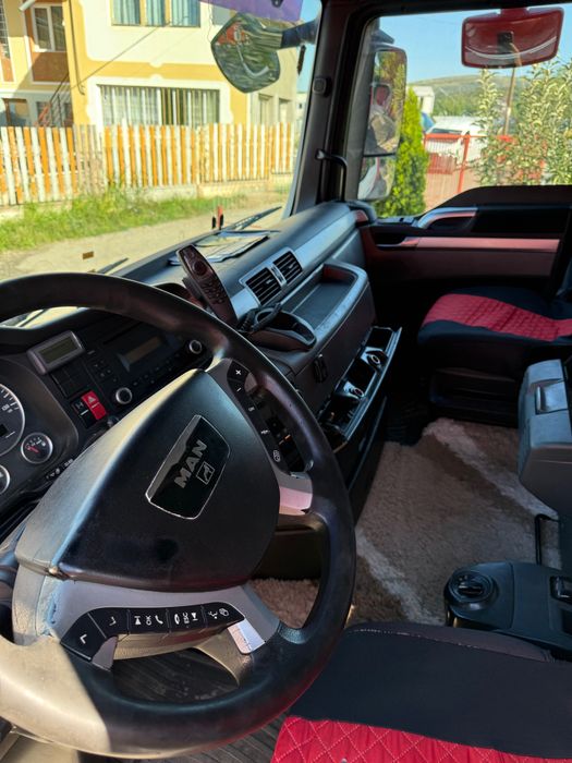 Man (camion tandem) tgx 24440,cu axa spate viratoare