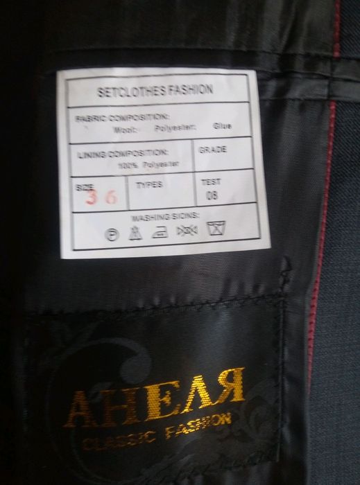 Продам серый костюм.
