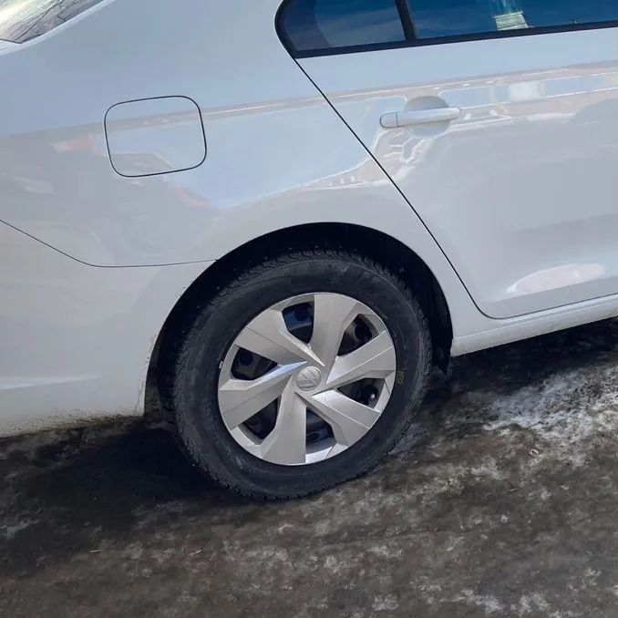 Продам диски с зимние шиной и колпаки