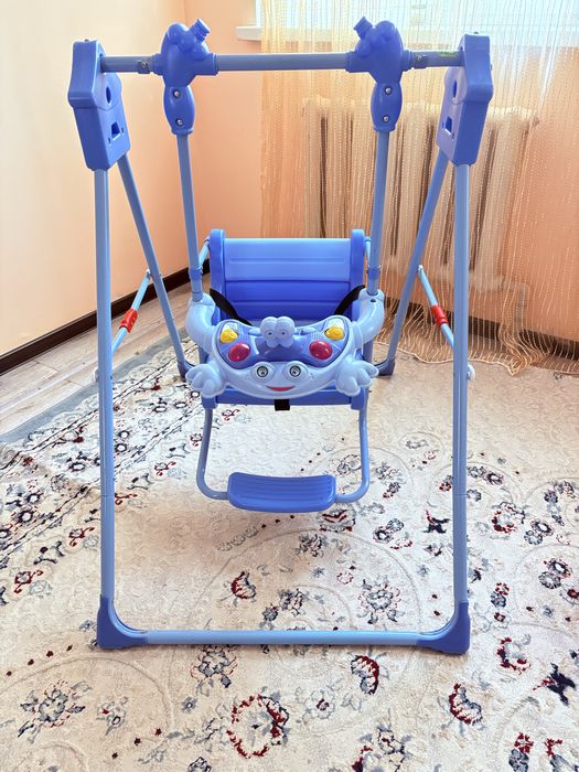 Продам детскую музыкальную качелю.