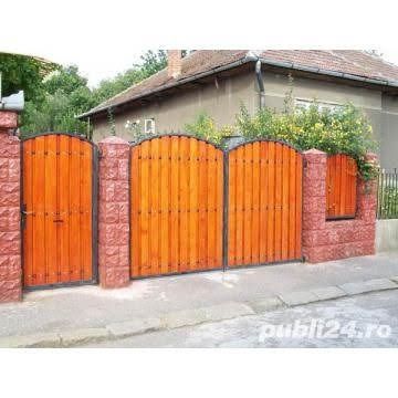 Executăm gard de plăci. beton  lemn