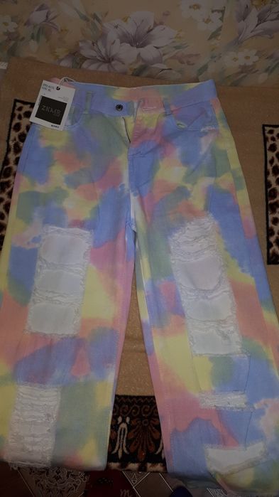 Продам женские джинсы