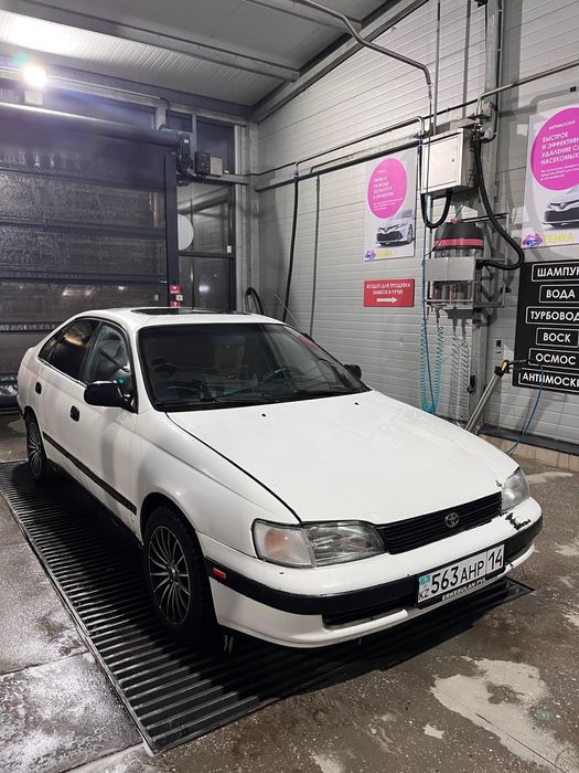 Тойота карина е