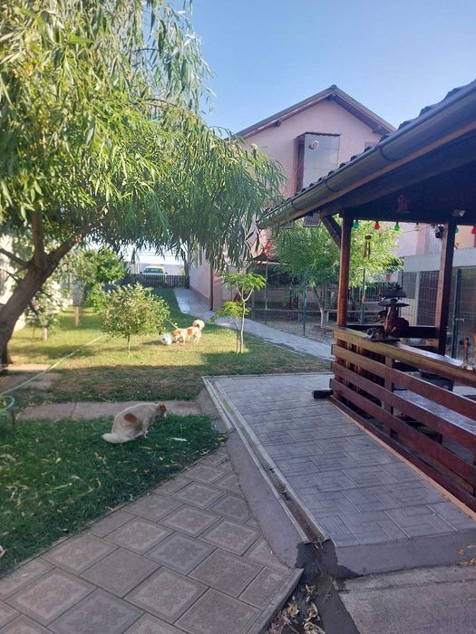 Vand casa parter 120 mp,teren 1000 mp + foisor si bucatarie vara 50 mp