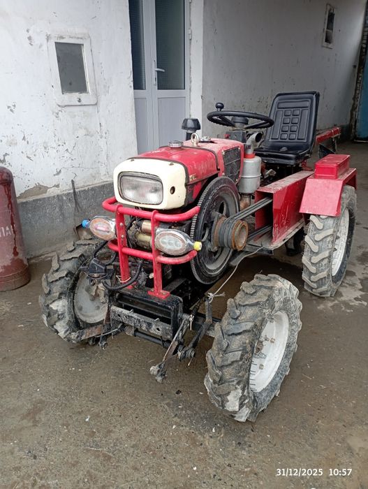 Mini traktor holati yaxshi frizasi pulligi jatkasi bor