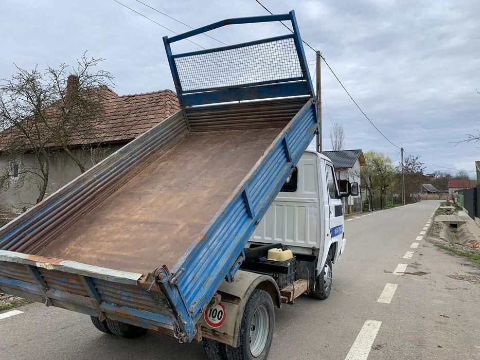 Nissan trade basculanta trilaterala