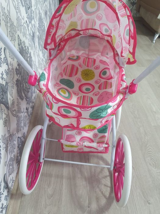 Игрушечная коляска для кукол