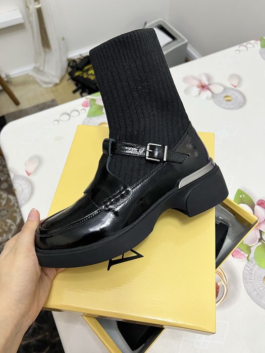 Продаю новые сапоги