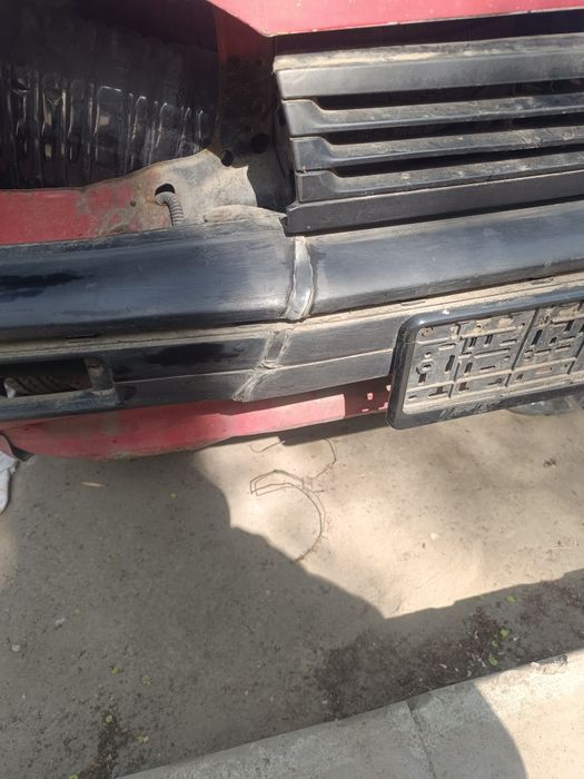 Передний бампер Mazda 323 BF