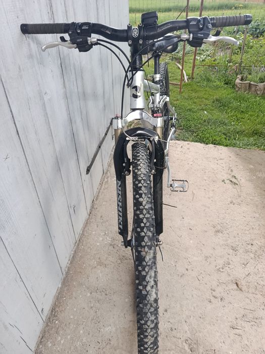Vând bicicleta nishiki full suspensie