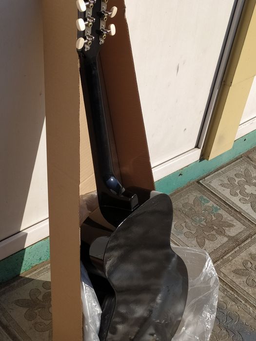 Новая акустическая гитара