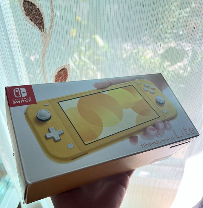 Consolă Nintendo Switch Lite la cutie + Minecraft include Super Mario mash-up