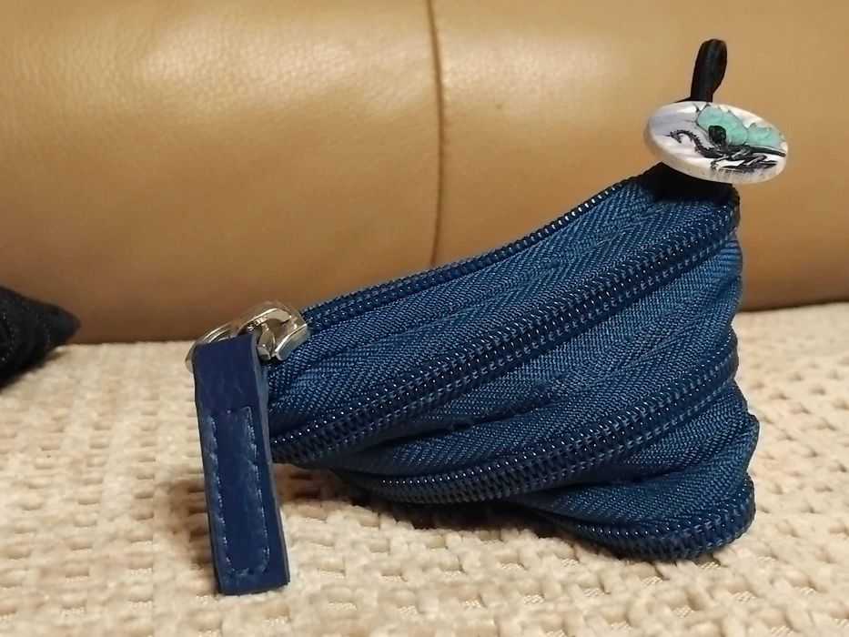 Ключодържател с възможност за прибиране на стотинки