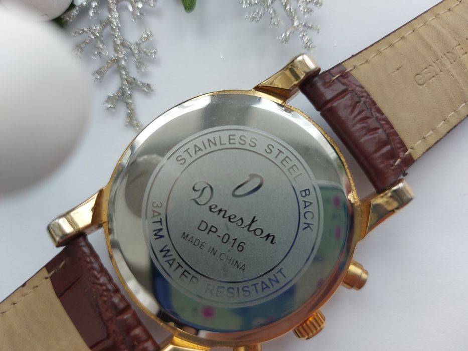 Новые наручные часы .