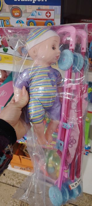 Bebelus de jucarie cu cariucior