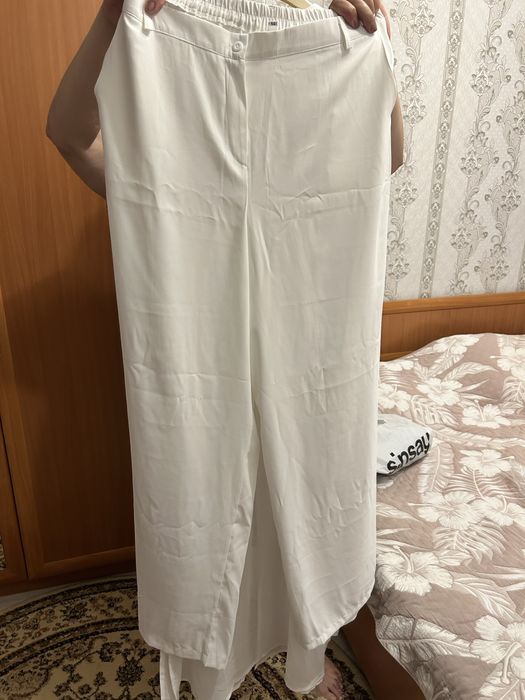 Продам брючный костюм новый