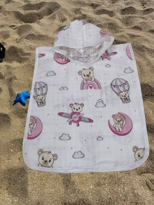 Плажът зове! Вземи своето стилно пончо сега