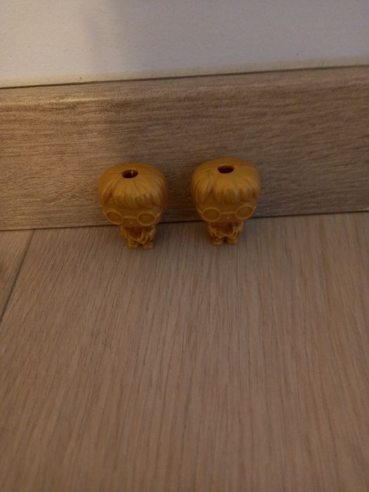 Vand 2 figurine Harry Potter Gold de colecție