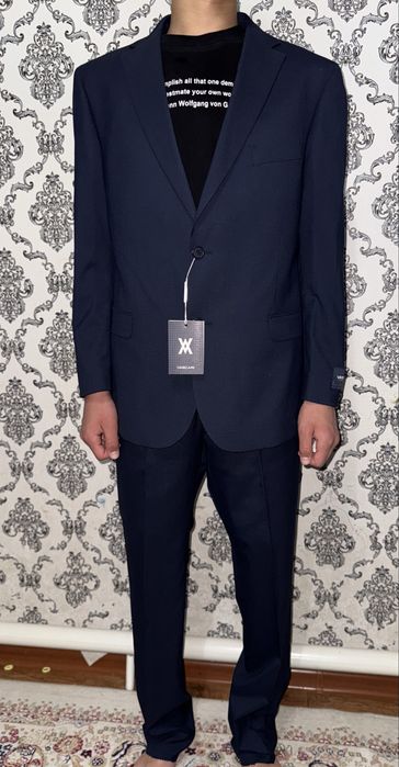 Срочно Продам новый  костюм